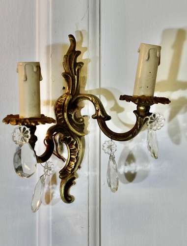 A pair of French Brass Twin Wall Lights The lights are in the classical style