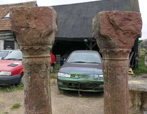 A Pair of Ancient Corinthian Type Stone Columns