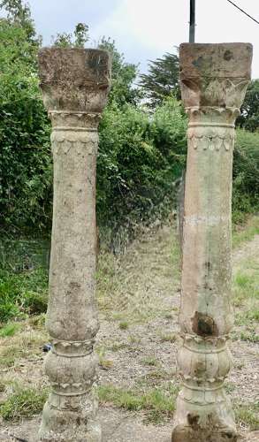 A Pair of Ancient Corinthian Type Stone Columns