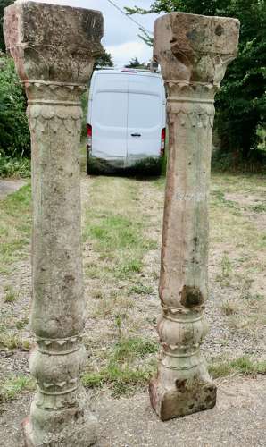A Pair of Ancient Corinthian Type Stone Columns