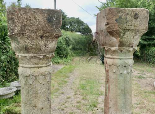 A Pair of Ancient Corinthian Type Stone Columns