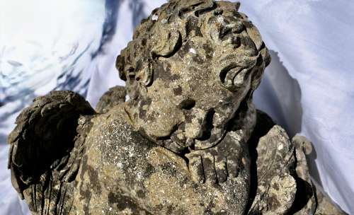 French Weathered Stone Statue of a Sleeping Putti, Baby Cherub with Wings