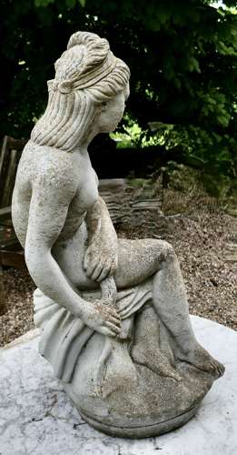 Old Weathered Statue of the Goddess Tyche Holding a Snake