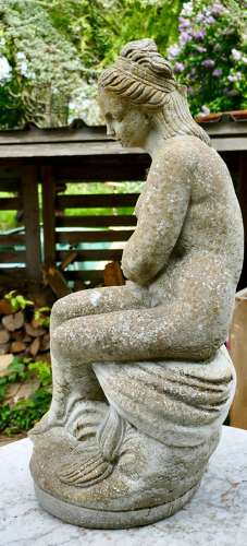 Old Weathered Statue of the Goddess Tyche Holding a Snake