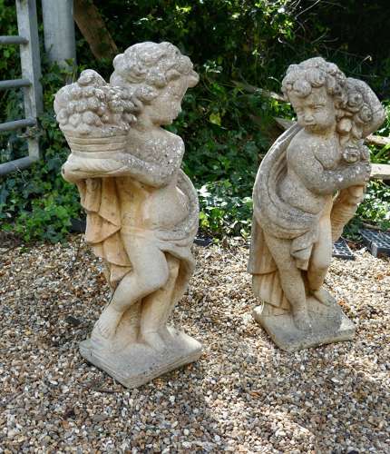 Pair of Old Weathered Classical Flower Children Statues