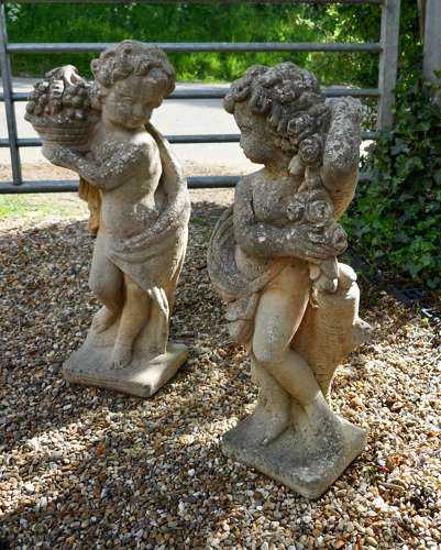 Pair of Old Weathered Classical Flower Children Statues