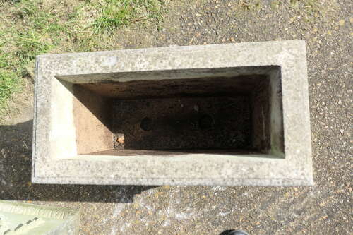 A Pair of Large Weathered Decorative Rectangular Planters