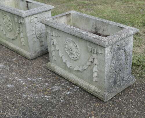 A Pair of Large Weathered Decorative Rectangular Planters