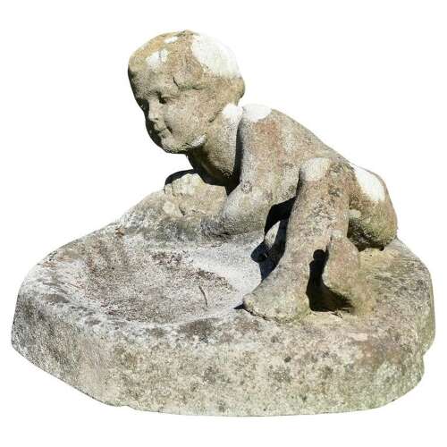 Weathered Garden Bird Bath with a Small Child