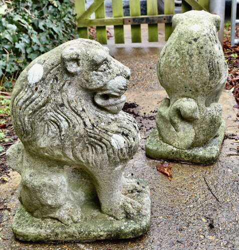 Pair of Stone Lion Guardians  These are weathered Statues of 2 Lions