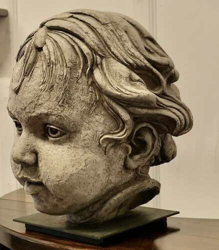Large Clay Bust of a Child by Philippe Seené, set on Bronze     This is an Exquisite Life