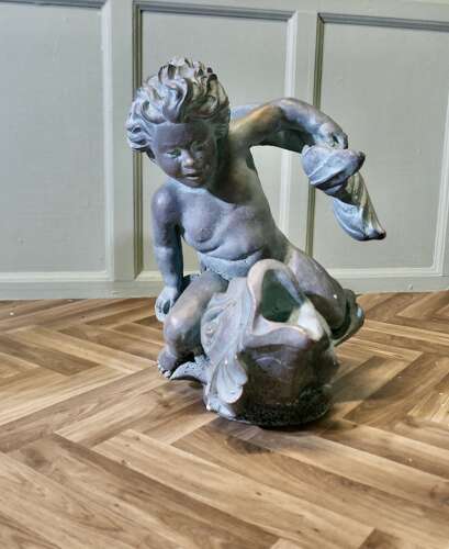 Sculpture of a Cherub Riding a Fish, Fountain Water Feature   A superb verdigris patinated