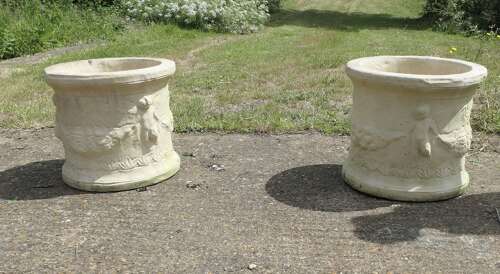 A Pair of Round Garden Planters with Winged Cherubs This is a good large pair
