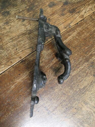 A Heavy Victorian Iron Door Knocker This is a classic Victorian door knocker