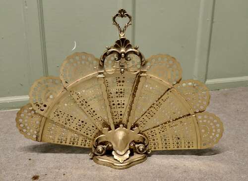 French Folding Brass Fire Screen Peacock’s Tail Fire Guard  This is a very attractive piec