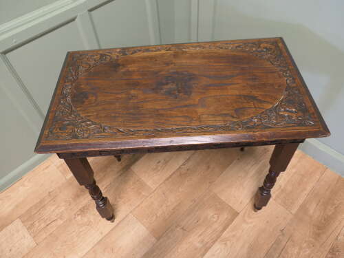 Elm Side Table with Celtic Carvings  This is a good solid table, the top is thick and it h