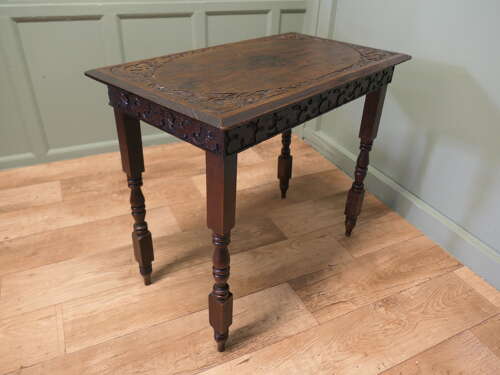Elm Side Table with Celtic Carvings  This is a good solid table, the top is thick and it h