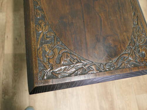 Elm Side Table with Celtic Carvings  This is a good solid table, the top is thick and it h