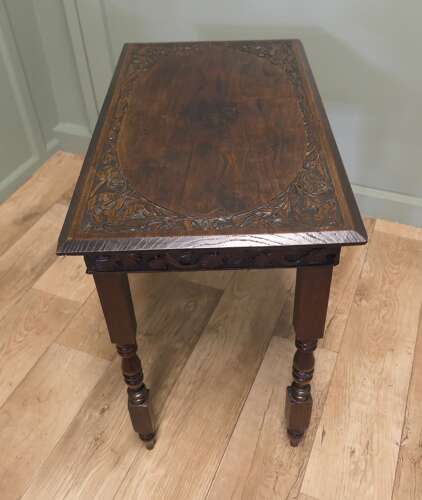 Elm Side Table with Celtic Carvings  This is a good solid table, the top is thick and it h