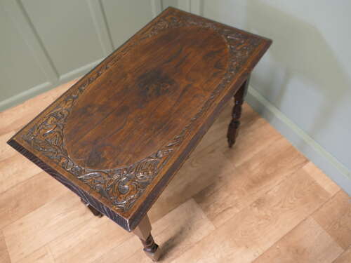 Elm Side Table with Celtic Carvings  This is a good solid table, the top is thick and it h