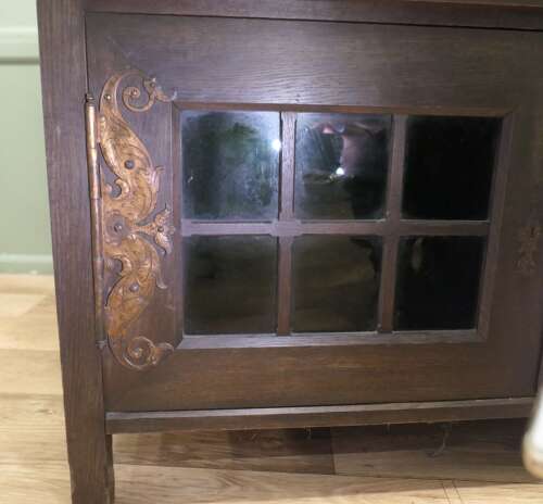Arts & Crafts Oak Sideboard by Leonard Wyburd for Liberty & Co. This piece is being offer