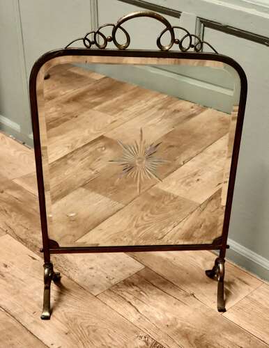 A Fine Quality Art Deco Brass and Sunburst Mirror Fire Screen  This is a decorative Fire S