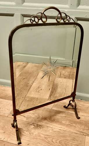 A Fine Quality Art Deco Brass and Sunburst Mirror Fire Screen This is a decorative Fire S