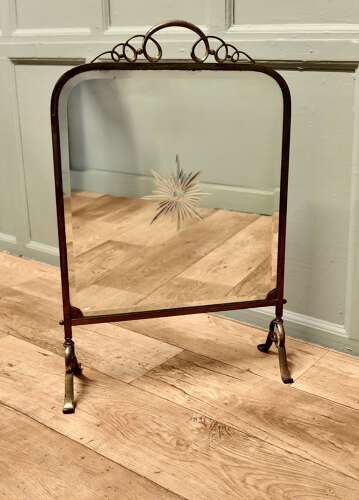 A Fine Quality Art Deco Brass and Sunburst Mirror Fire Screen This is a decorative Fire S